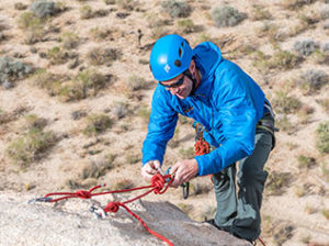 building a rock climbing anchor in Joshua Tree National Park